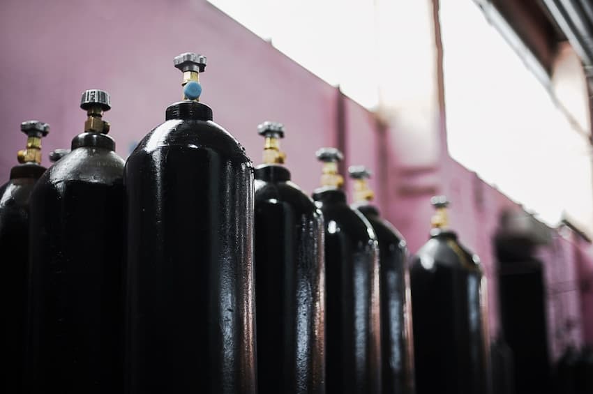 A row of black cylinders