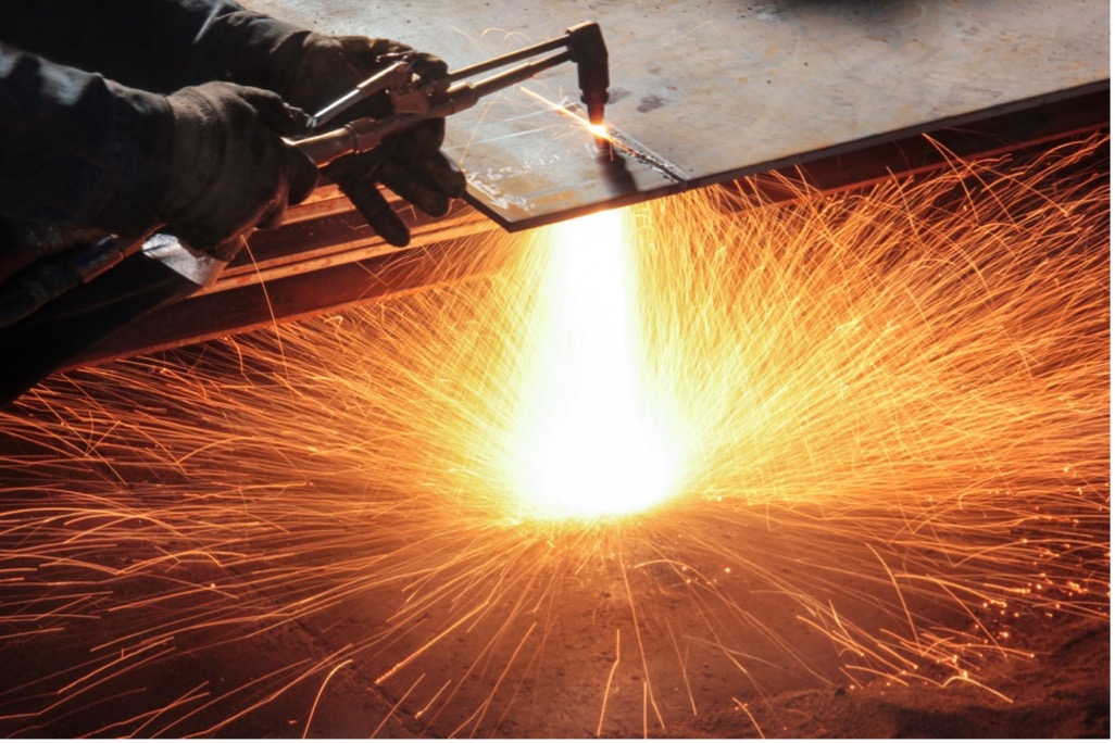 A close-up of a welding torch