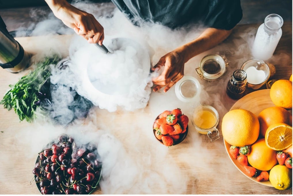 A person cooking with smoke