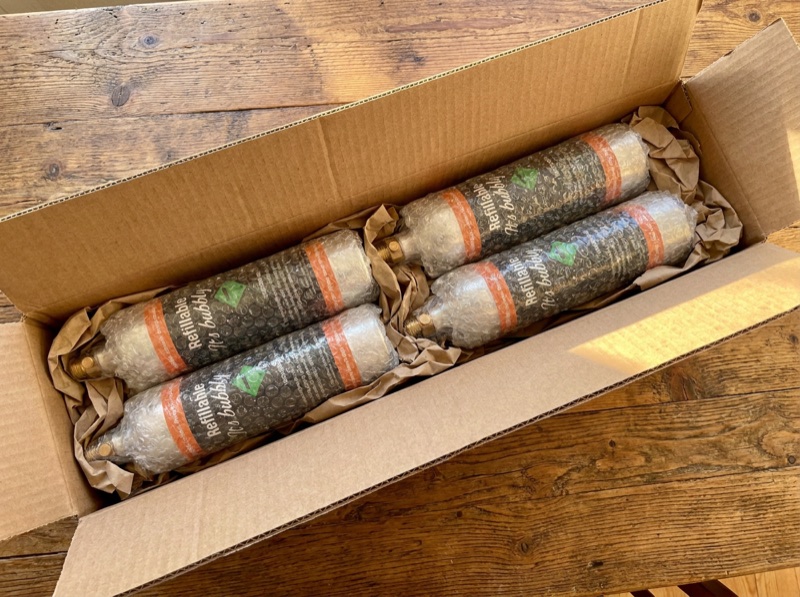 Boxing up empty CO2 cylinders for DPD drop-off